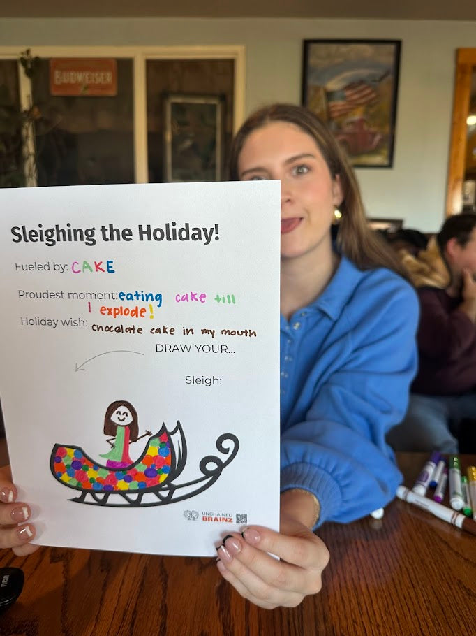 Teen with funny sleigh drawing for christmas holiday, creative activity. 