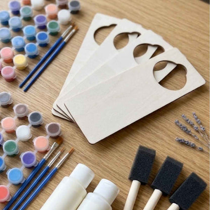 Set of wooden door hanger painting kits with foam brushes and paint for multigenerational family gatherings and group crafts