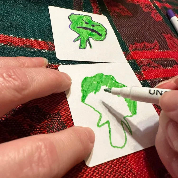 Child drawing on a blank Memory Mix card, DIY memory game gift kids can make